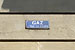 Anciennes plaques sur façade d'immeuble  indiquant « GAZ A TOUS LES ÉTAGES  » - 2023